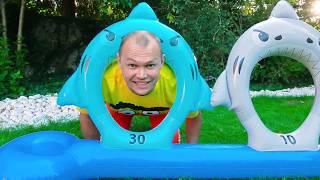 Max and Katy play with daddy Outdoor activity toys