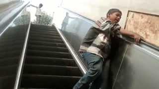 Street Children stopping escalator at Rajiv Chowk