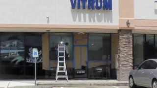 Visible Vitrum Spraying RPS 9 Directly on the Outside of A Storefront Window