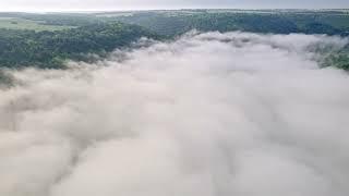 Drone Descends From Height Down Into Foggy Haze FREE STOCK VIDEO