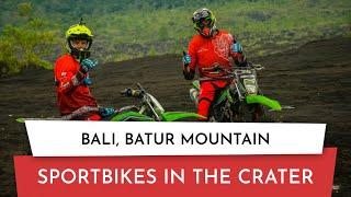 Ride on Enduro Sport Bikes in the crater of Batur volcano, Bali, Indonesia. Terrible biker accident