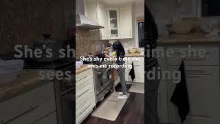 Ella is cooking dinner