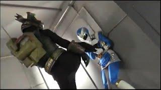 Blue Ranger beaten by sinister robot