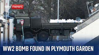 Military vehicle carries unexploded WW2 bomb through deserted streets of Plymouth