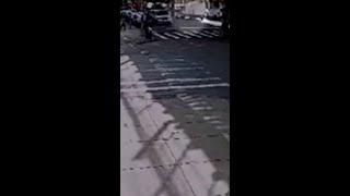 Woman pushing stroller narrowly escapes harm as buses involved in crash act as shield