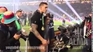 Kid rushes field. Tackled by security guard. Sonny Bill Williams gives him his Rugby World Cup medal
