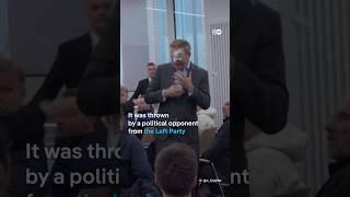 German FDP leader Lindner gets hit with foam pie during campaigning | DW news