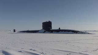 Royal Navy Submarine HMS Trenchant Surfaces in Arctic Ocean