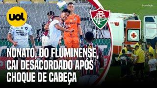 JOGADOR DO FLUMINENSE CAI DESACORDADO APÓS CHOQUE DE CABEÇA E DEIXA O MARACANÃ DE AMBULÂNCIA