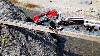 Lego trains crashing on a bridge