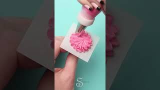 Piping a royal icing flower