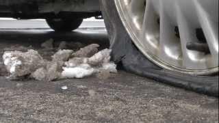 Giant pothole swallows up a dozen cars