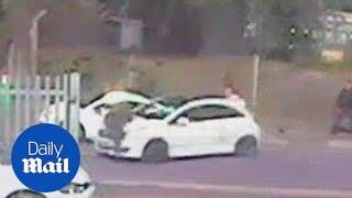 Man forced to cling on bonnet of thieves' getaway car after raid