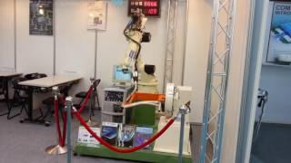 OTC ROBOT WITH SINGLE AXIS TURN TABLE POSITIONER