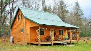 Solar Off-Grid Log Cabin on 20 Acres For Sale