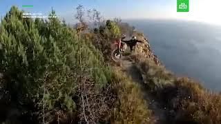 Motorbiker falls off cliff