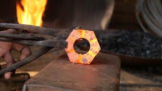 KNIFE ~ BLACKSMITHING / Garden tools form a machine nut.