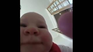 Baby eating camera meme (Original)