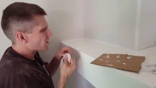 Process of caulking minor gaps between wall or ceiling of cabinetry