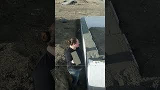 Springtime Montana   Kylee troweling her footers