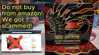 We got scammed by amazon for an opened pokemon lost origin elite trainer box