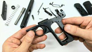 FN Browning M1910 pistol disassembly and reassembly in close up