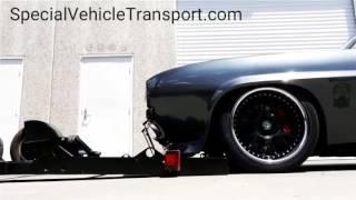 Airbagged Trailers loading Speed Society's Camaro