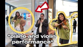 The girl asks me to play Saint-Saëns on the PIANO and a VIOLINIST joins me 