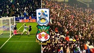 HECTIC SCENES AS WREXHAM HIT DISPUTED WINNER AT HUDDERSFIELD