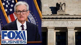 Fed projects weaker growth, higher inflation
