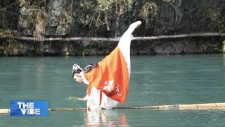 Performer gives twist to traditional bamboo drifting sport