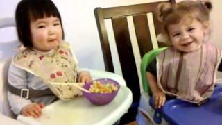 Eva feeds Ruby strawberry