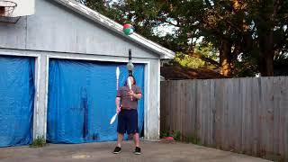 Amazing Juggler Uses A Beach Ball & Leaf Blower While Juggling Clubs