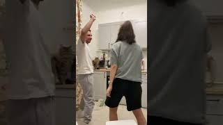 Dancing man tries a spin and ends up shattering the oven door!