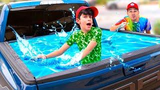 Jason and Alex pretend to have a Pool in the Truck