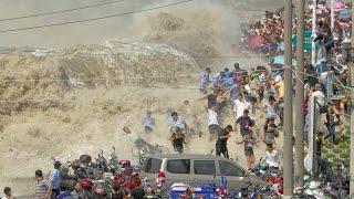 China's mega waves up to 5 meters strikes Qiantang River, causing thousands of tourists to run away