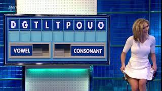 Rachel Riley @Slight skirt lift