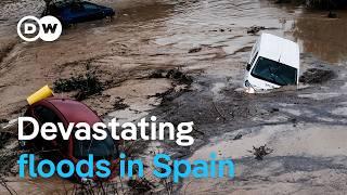 Flash flooding in Spain kills dozens, rescue operations underway | DW News