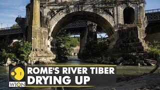 Water levels of Rome's historic river Tiber very low | Remains of Neronian Bridge emerge | WION