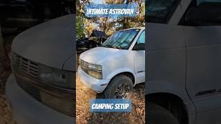 "Chevy Astrovan camping setup with DIY awning and tent – perfect for off-grid adventures!"