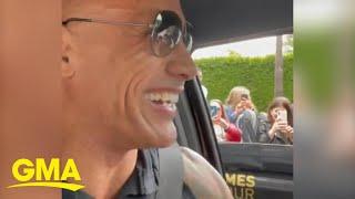 The Rock surprises Hollywood tour bus in his neighborhood l GMA