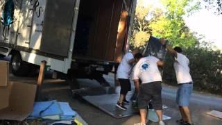 Sonoma County Movers move a nine foot Parlor Grand piano. North Bay Movers does it again.........