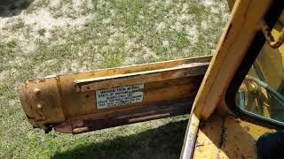 GovDeals: Dresser 710A Motor Grader with Side Blade Attachme