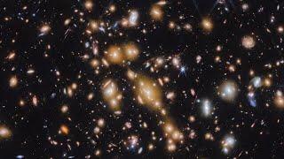 Pan of Cosmic Gems (galaxy cluster SPT-CL J0615−5746)