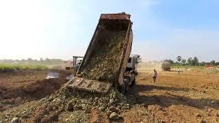 Big Dumpt Truck Team Work With Big Buldozer good work