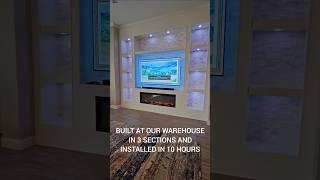 Large TV media wall with stacked stone and electric fireplace #tvwall #mediawall #fireplacewall