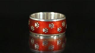 Ring with cat paws and ruby enamel in silver