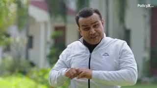 PolicyX health insurance ad featuring Virender Sehwag