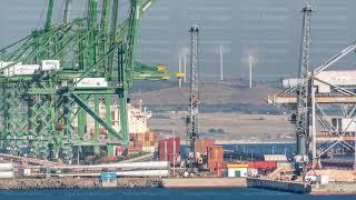 Aerial view of container cargo terminal of commercial port timelapse, business logistics and