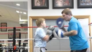 Ricky Hatton's son, shows off body punch combinations as he works the mitts with dad